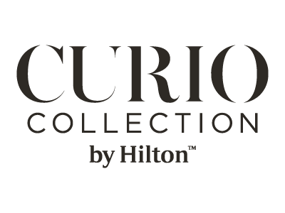 Curio Collection By Hilton Logo