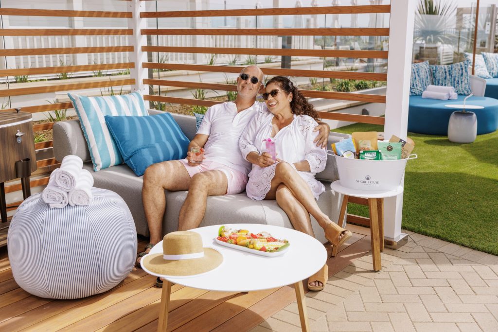 A middle aged couple enjoying food and more at a nice hotel - Hotel Photography - Shore House at the Del
