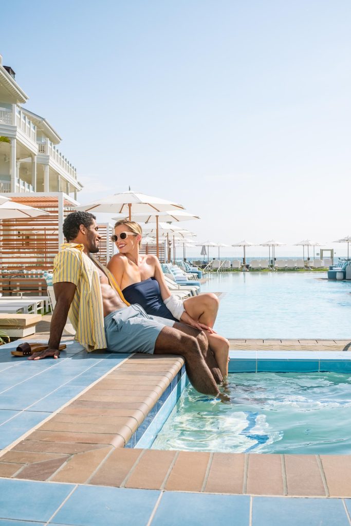 A young couple by the pool - Hotel Photography - Shore House at the Del