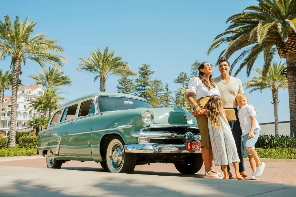 A young family with a vintage car - Hotel Photography - Shore House at the Del